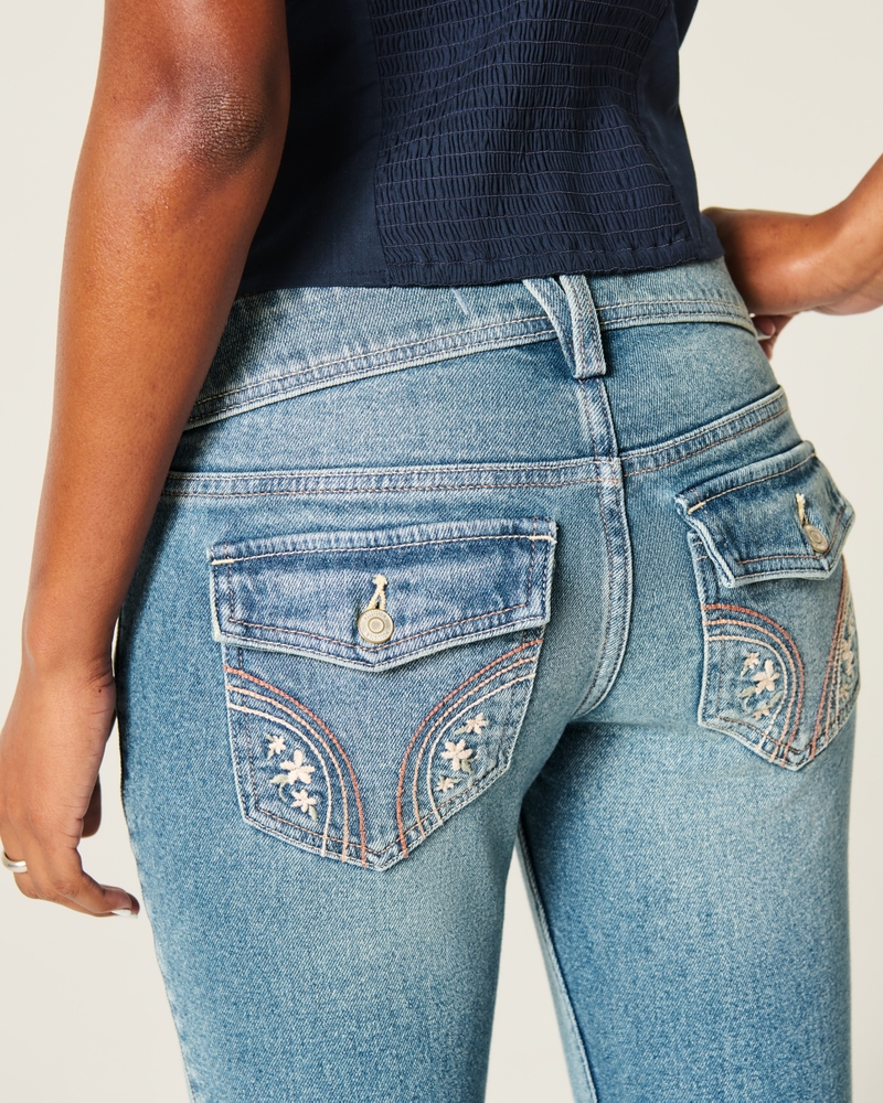 bootcut-jeans mit niedrigem bund schmetterlingsstickerei und mittlerer waschung