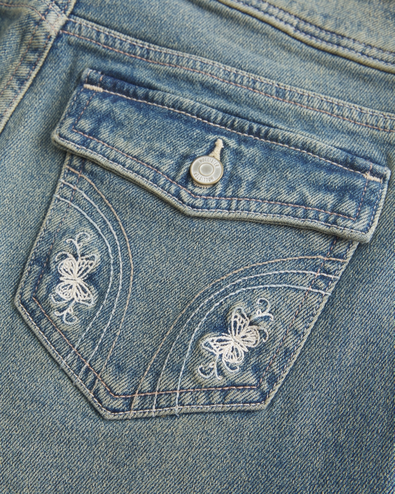 bootcut-jeans mit niedrigem bund schmetterlingsstickerei und mittlerer waschung