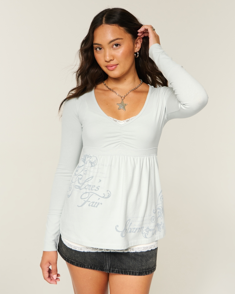 babydoll-top mit langen Ärmeln rüschenoberteil und brustmuster.