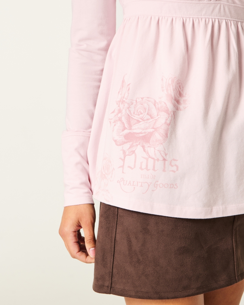 babydoll-top mit langen Ärmeln rüschenoberteil und brustmuster.