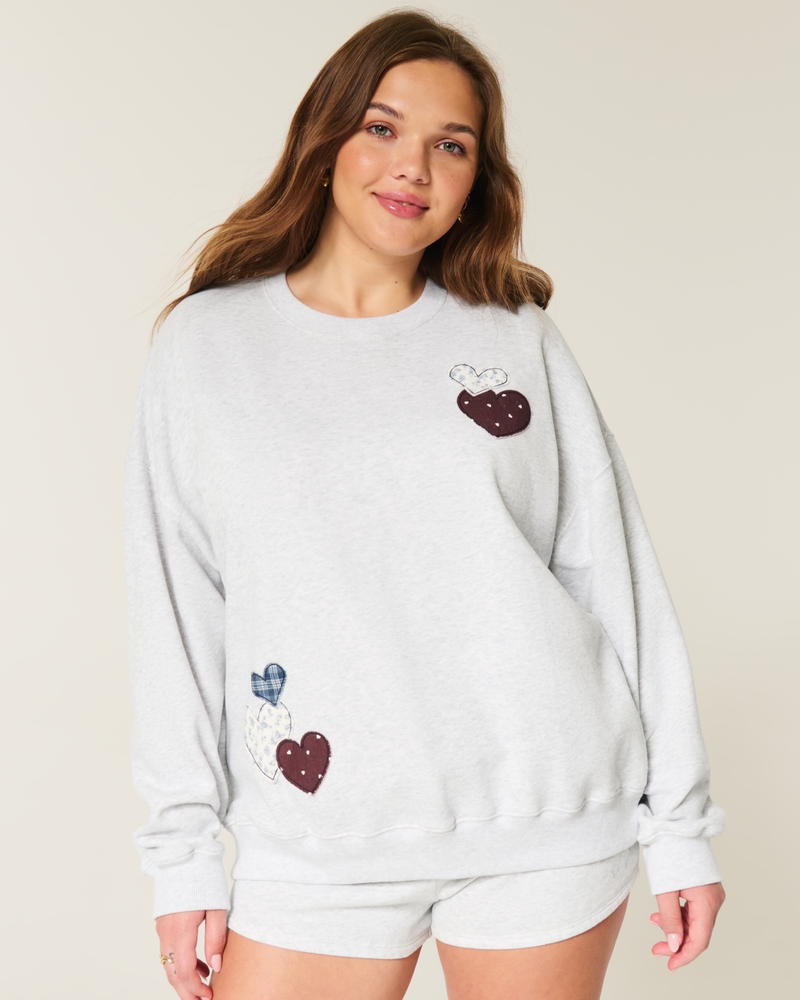 oversized sweatshirt mit engelsflügelmuster und rundhalsausschnitt