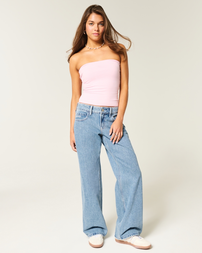 hüftig geschnittene mittelblaue jeans mit gestickten früchten und lockerer passform