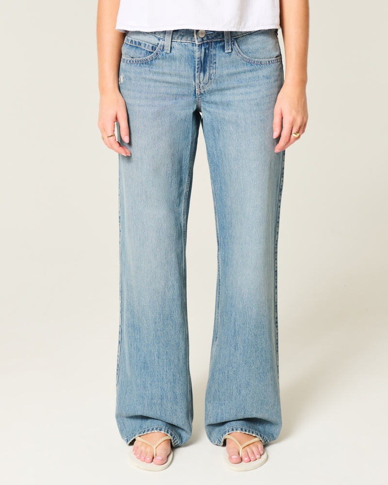 hüftig geschnittene mittelblaue jeans mit patchwork-muster und extraweitem schnitt.