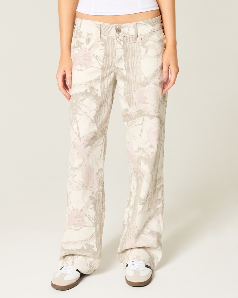 hüftig geschnittene mittelblaue jeans mit patchwork-muster und extraweitem schnitt.
