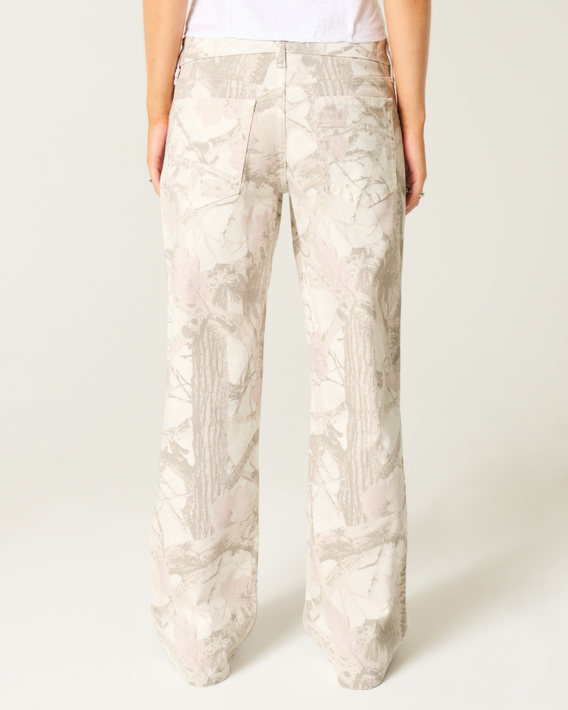 hüftig geschnittene mittelblaue jeans mit patchwork-muster und extraweitem schnitt.