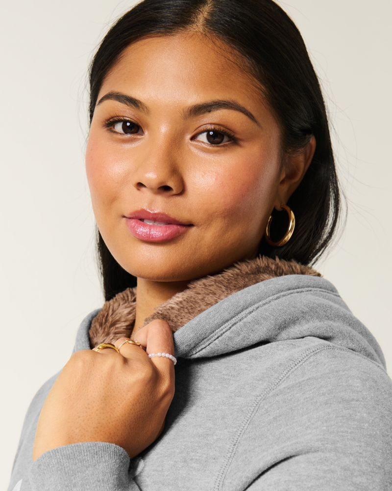 kapuzenpullover mit muster und futter aus kunstfell