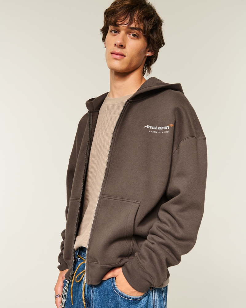 quadratischer kapuzenpullover mit reißverschluss und dem red bull racing logo in oracle bone script-schriftzug
