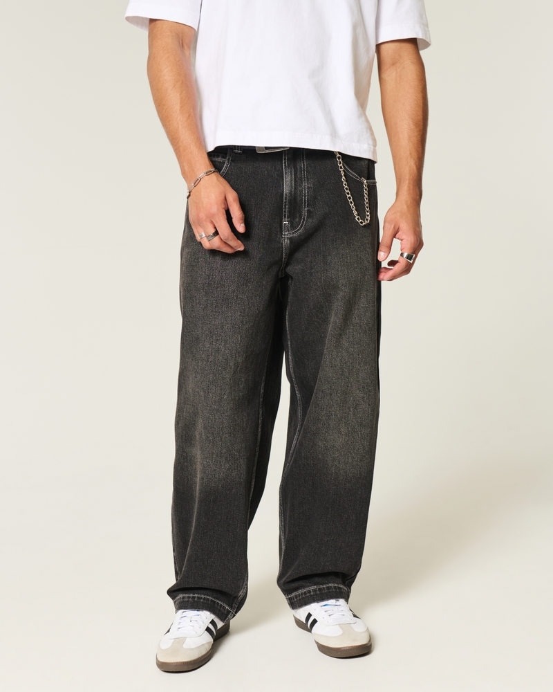 schwarze gewaschene jeans im skateboard-stil mit schlangenstickerei und lockerer passform