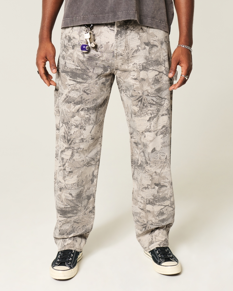 camouflage-skateboard-jeans locker sitzend malerjeans