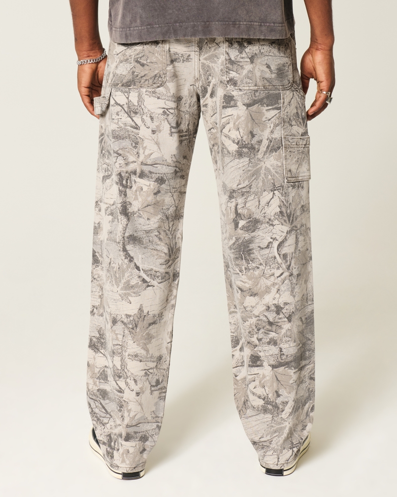 camouflage-skateboard-jeans locker sitzend malerjeans