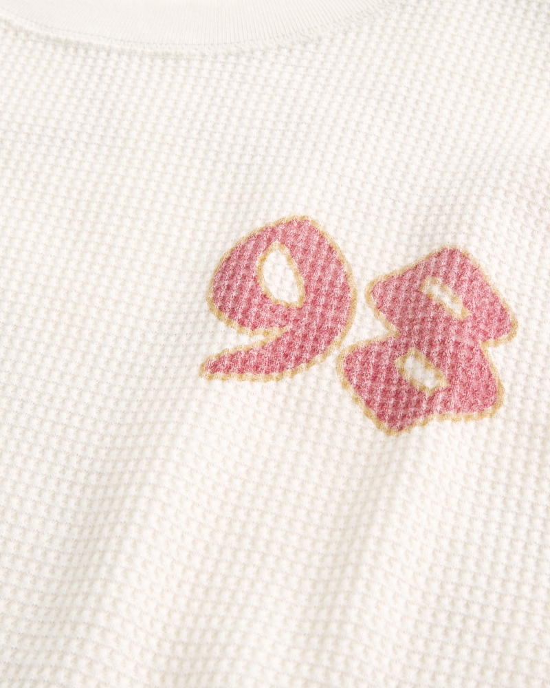 warmes shirt mit rundhalsausschnitt und glücksmuster