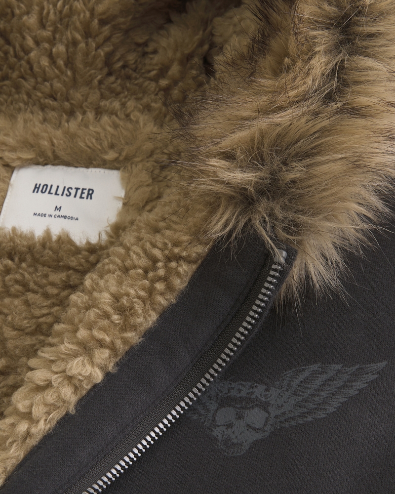 kapuzenpullover mit reißverschluss und kunstfellfutter gemustert.